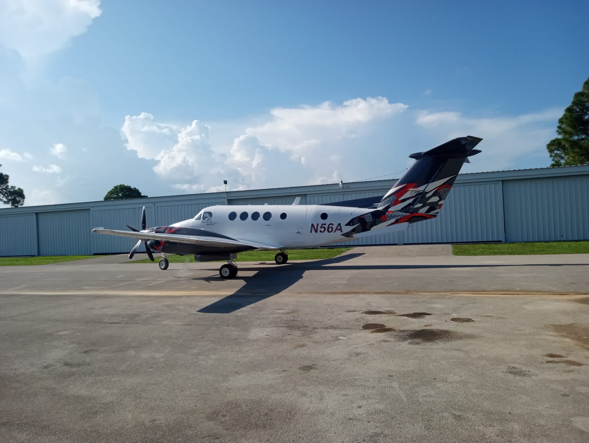 Close-up of the distinctive red and black tail artwork on the recently sold Beechcraft King Air B200C N56A