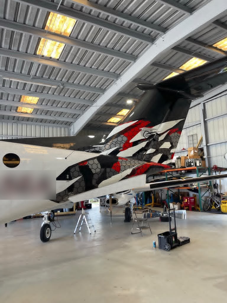 Turboprop under maintenance inside the 305 SKY hangar at Fort Lauderdale Executive Airport (FXE)