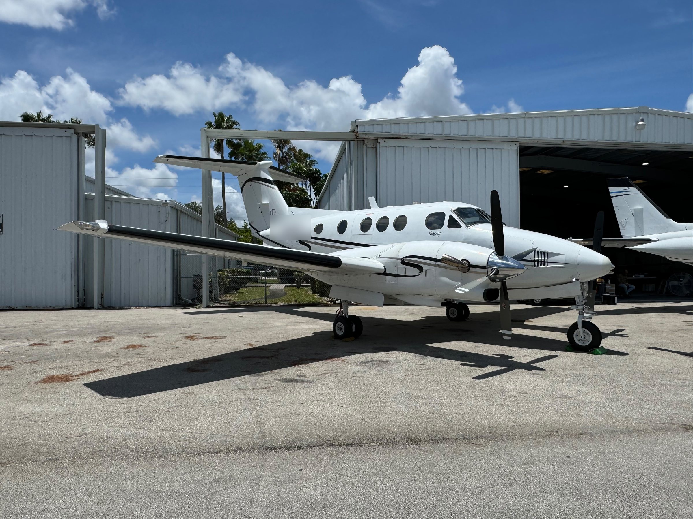 Beechcraft King Air on the ramp outside the 305 SKY hangar at Fort Lauderdale Executive Airport (FXE)