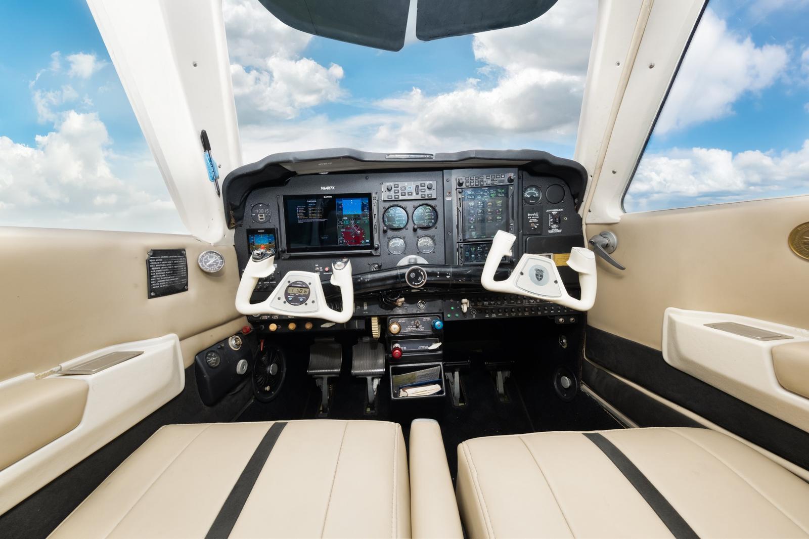 Beechcraft Bonanza panel with a Garmin touchscreen primary flight display and navigator newly installed.